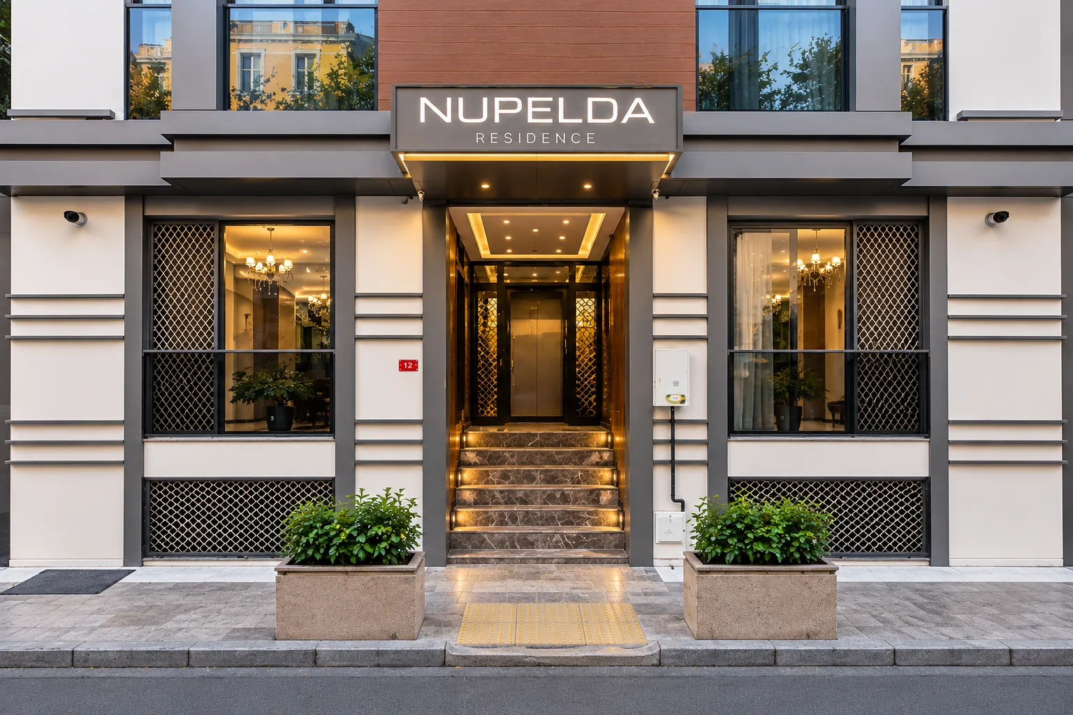 Nupelda Residence Hotel'in gündüz görünen girişi